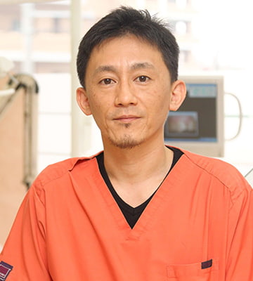 塚本副院長の顔写真